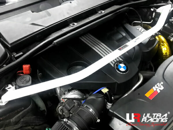 Ultra Racing - 2pt Front Strut Tower Brace - 2006-2012 BMW E90 Sedan / E84 / E87 / E91 - UR-TW2-1026